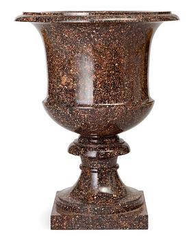 563. A Swedish first half 19th Century porphyry urn.