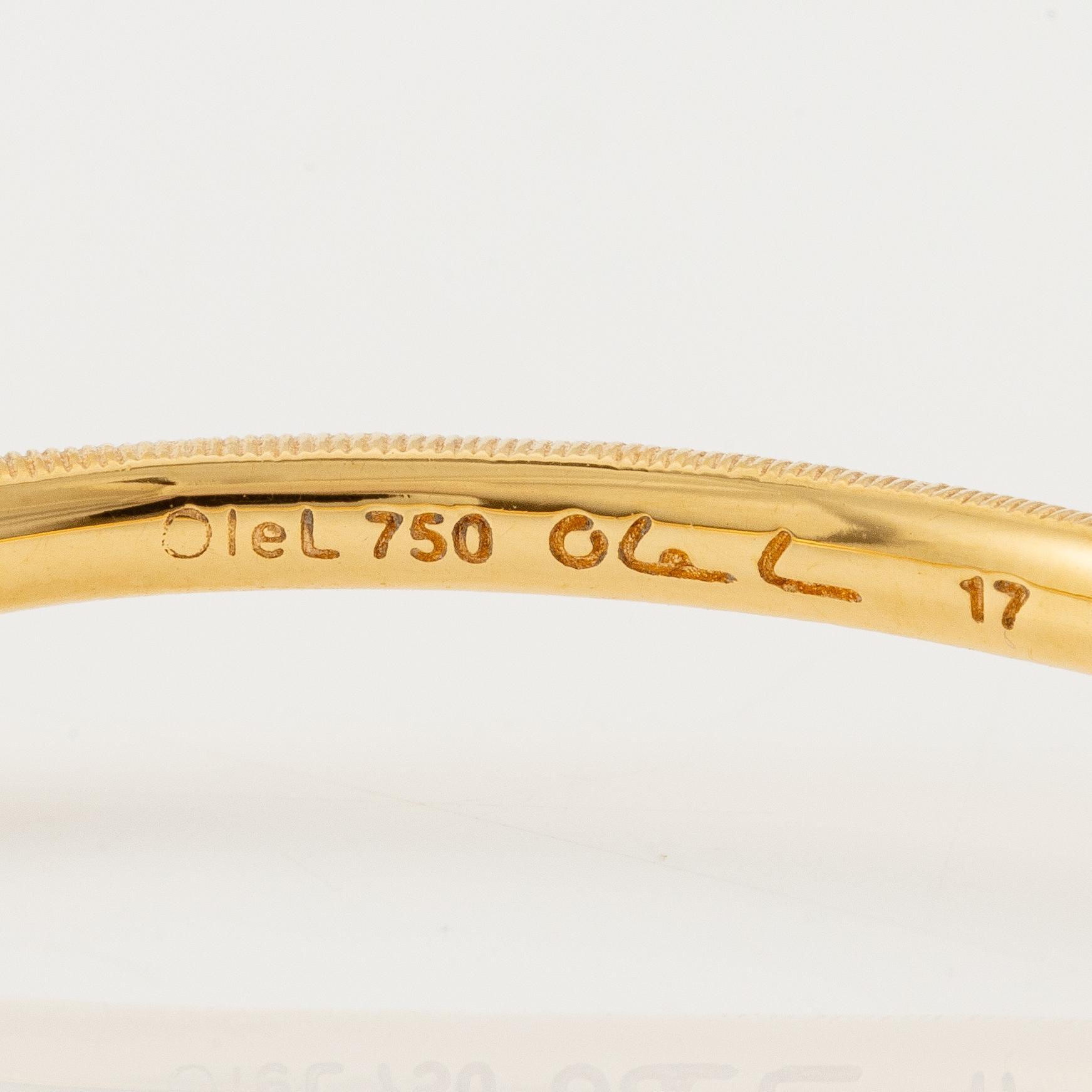An Ole Lynggaard bracelet 18K gold in the shape of a snake.