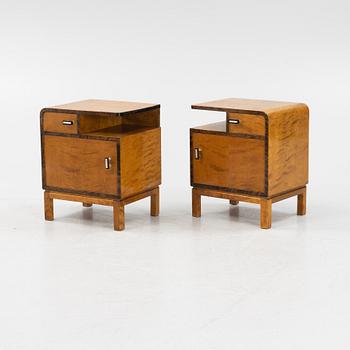 A pair of birch veneered 1930's bedside tables.