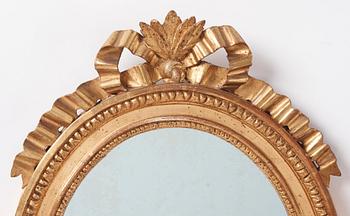A pair of Gustavian giltwood one-branch girandoles, Stockholm, late 18th century.
