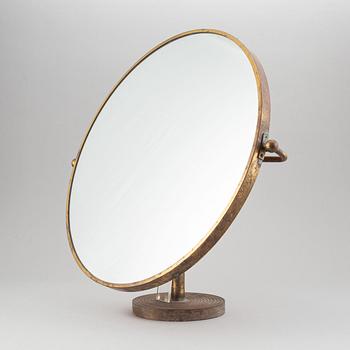 A model 2214 brass table mirror by Josef Frank for Firma Svenskt Tenn.