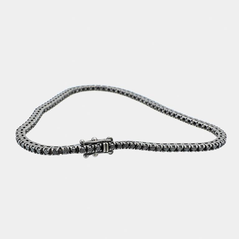 Lanza Carlo, tennis bracelet in 18K blackened white gold with round brilliant-cut black diamonds, Italy.