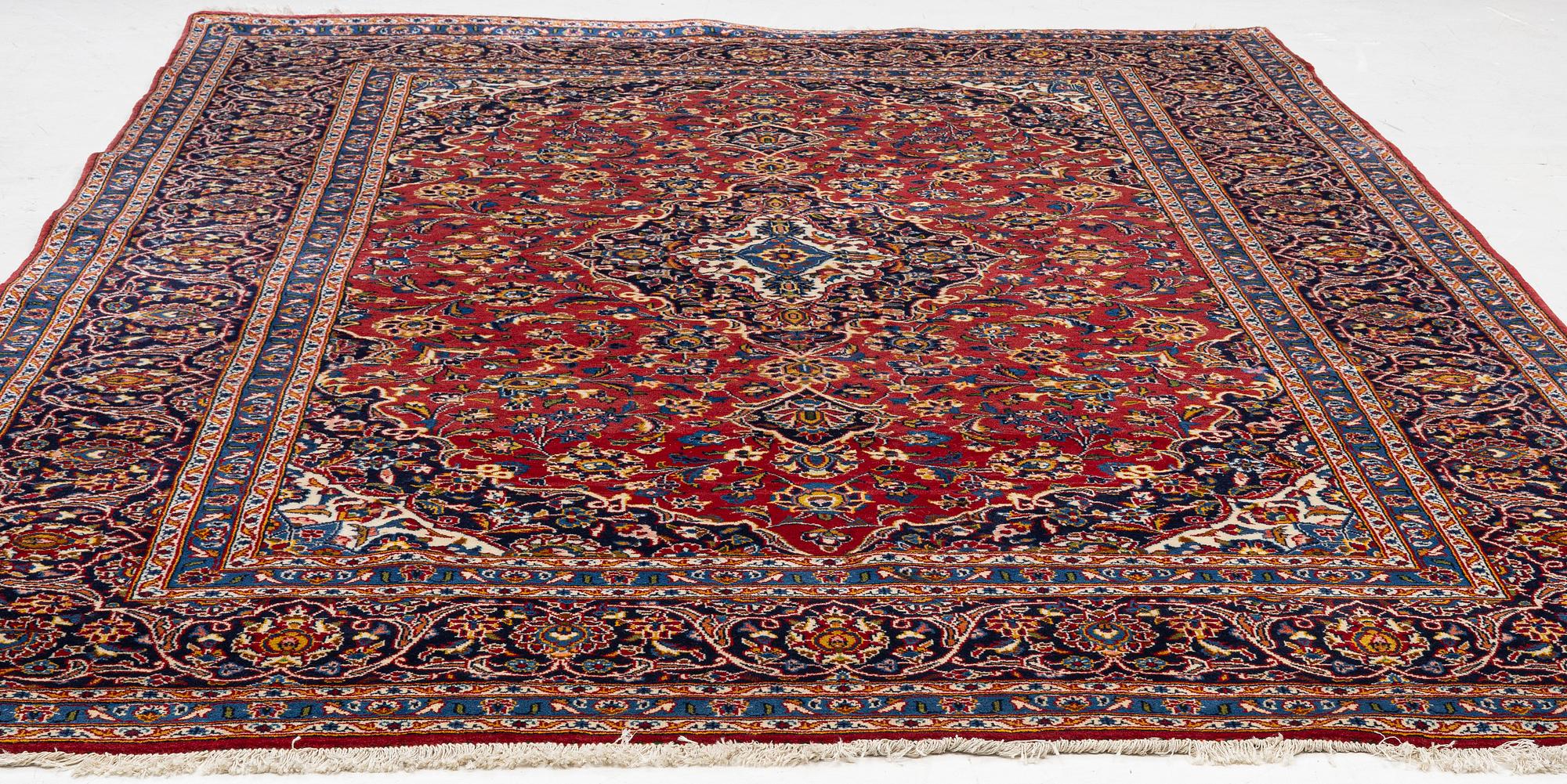 An oriental carpet, c. 340 x 240 cm.