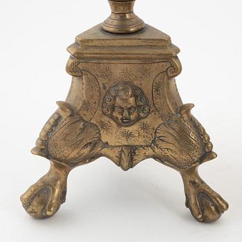 A pair of Baroque-style bronze candlesticks, 19th Century.