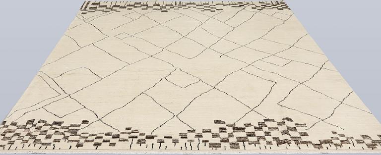 A Moroccan carpet, approx. 303 x 202 cm.