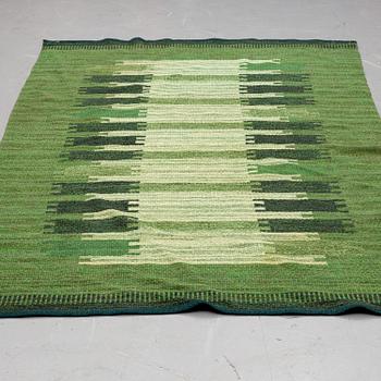 A CARPET, flat weave, ca 239,5 x 153-156 cm, signed ML, Sweden second half of the 20th century.
