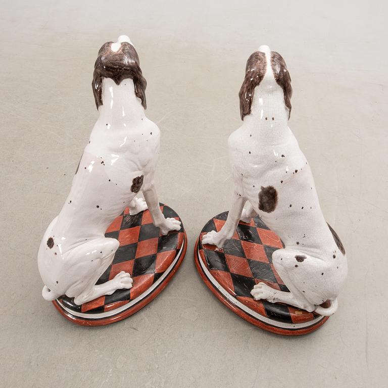 Decorative sculptures a pair England 20th century glazed ceramics.