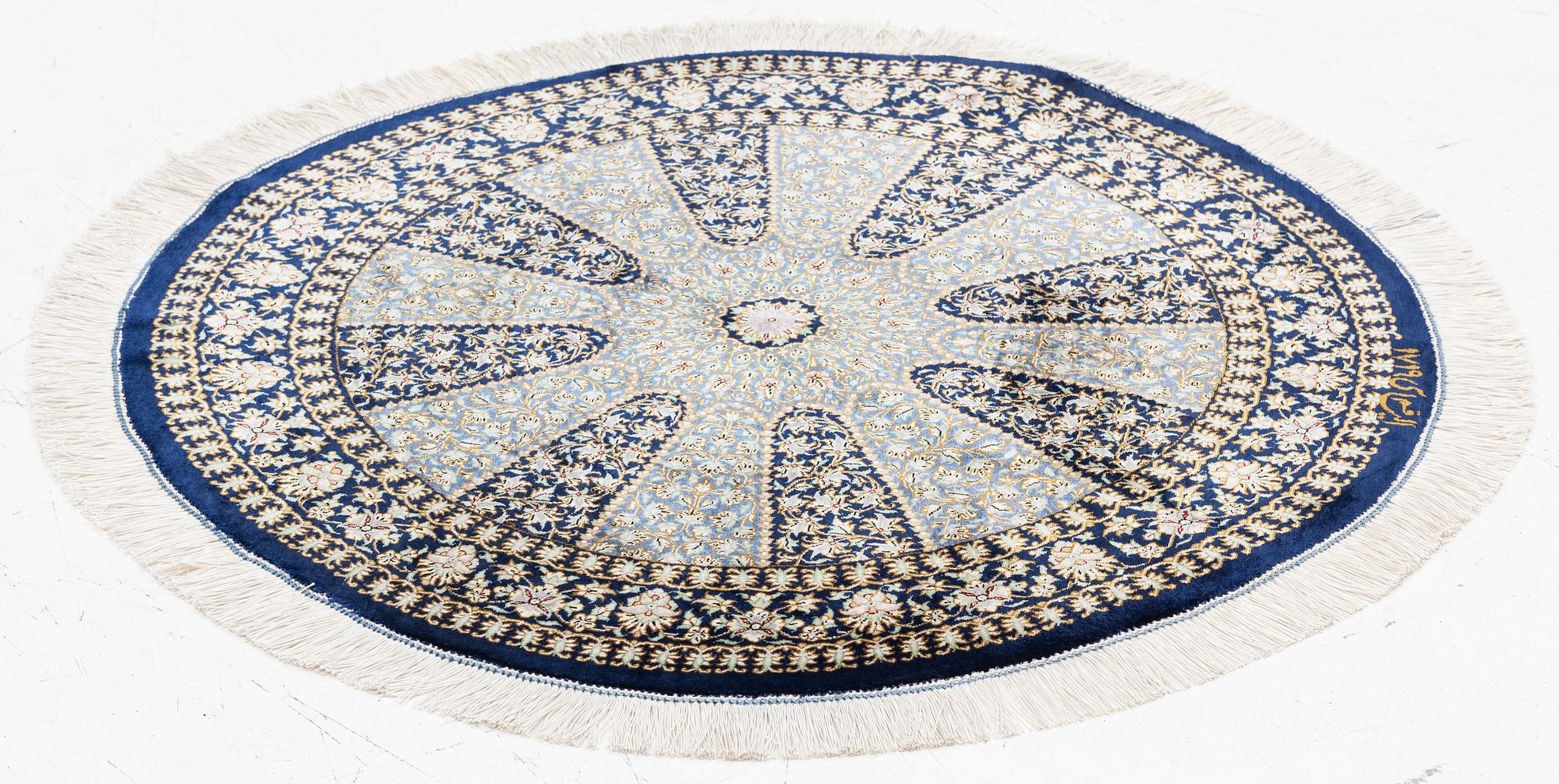Rug, Ghom, signed, diameter 80 cm.