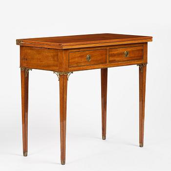 A late Gustavian mahogany games table, presumably by A. Nordström (Journeyman at G. Iwersson 1806-09).