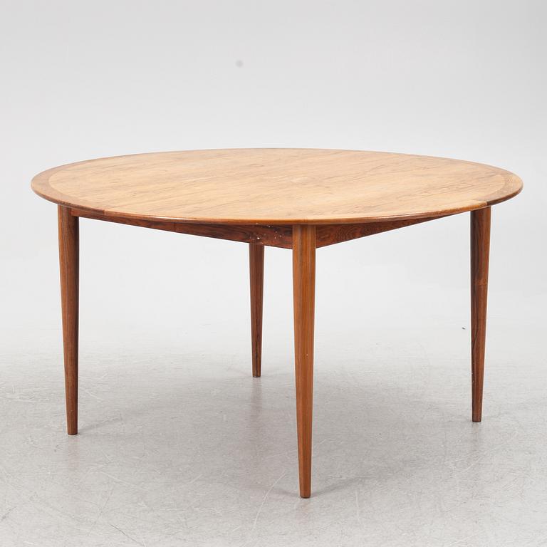 Niels Otto Møller, a rosewood dining table and eight rosewood chairs, Poul Jeppesen & JL Möller, Denmark, 1960's.