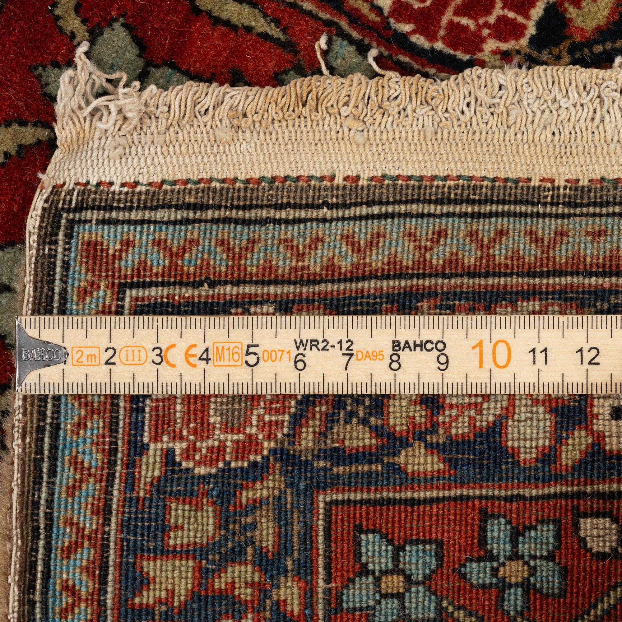 A pictoral Kashan 'Mohtasham' rug c. 80 x 58 cm.