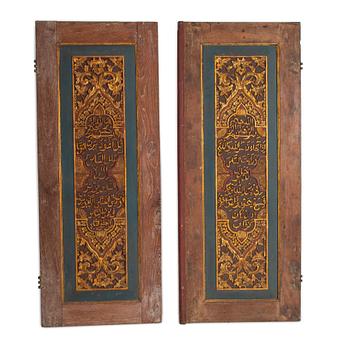 A pair of South East Asian carved wooden doors, presumably Java, 19th Century.
