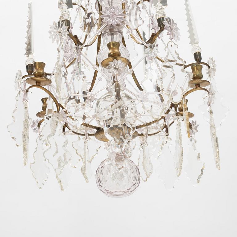 A six-light rococo-style chandelier, late 19th century incorporating older elements.