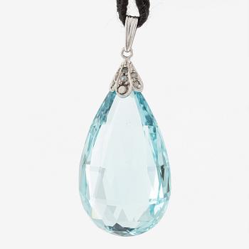 Pendant in platinum set with a briolette-cut aquamarine and rose-cut diamonds.