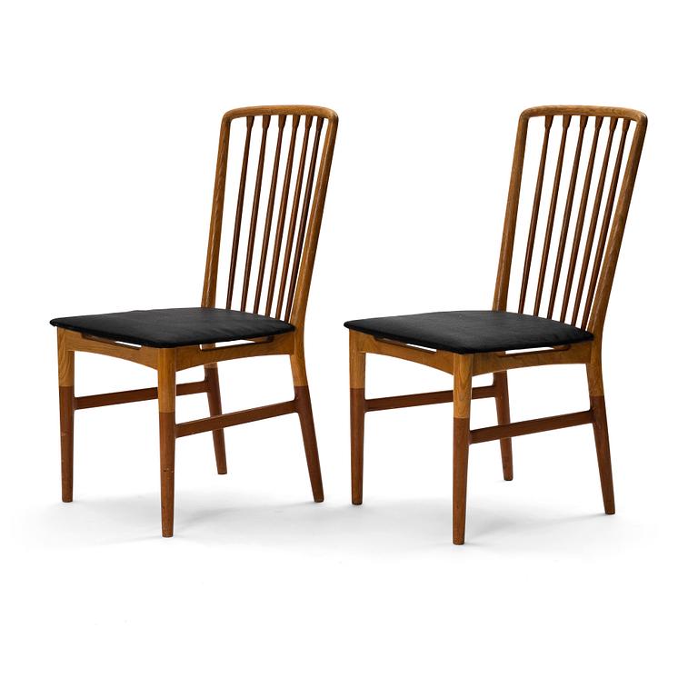 A pair of Scandinavian Mid Century Modern teak, oak and elm chairs.