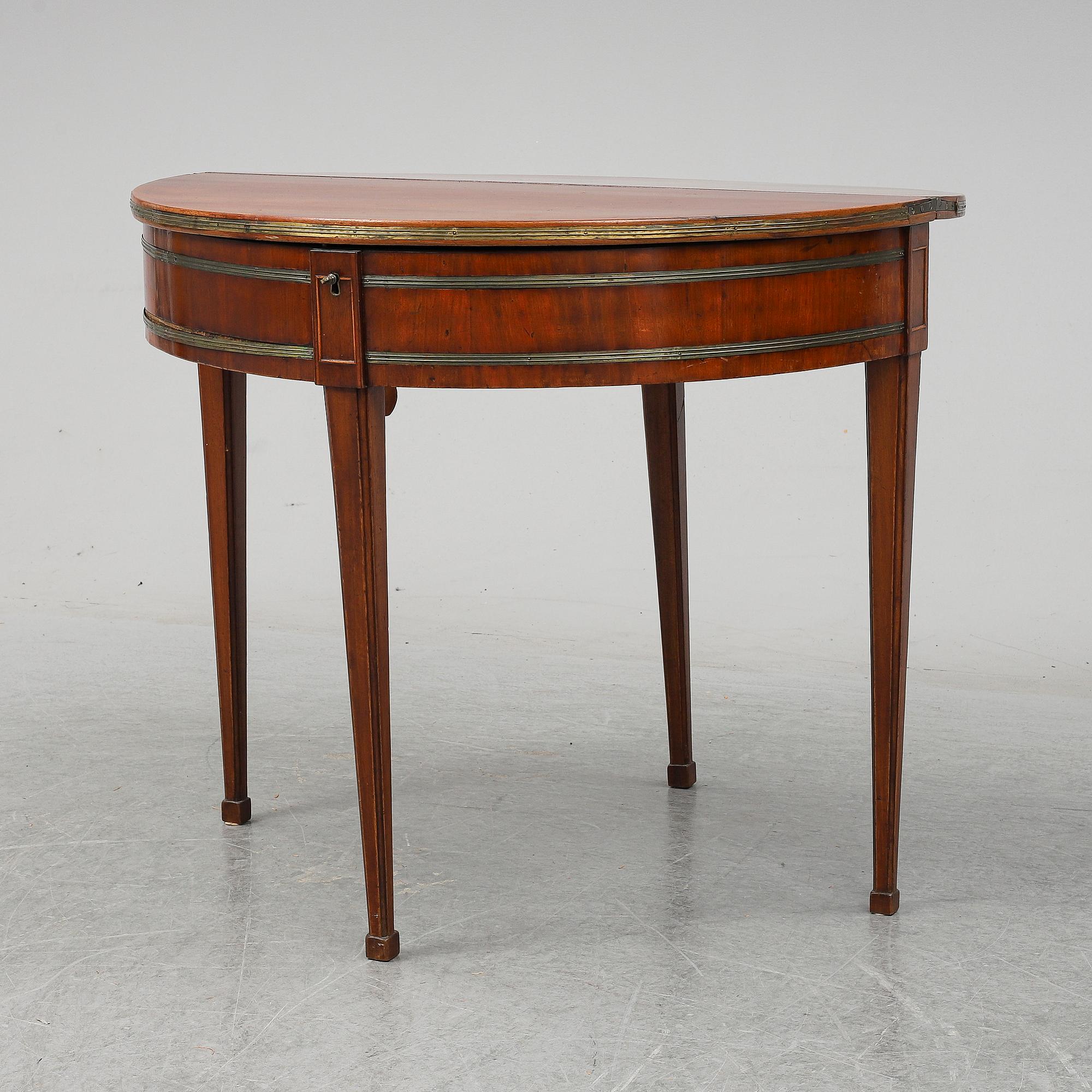 A Directoire games table.