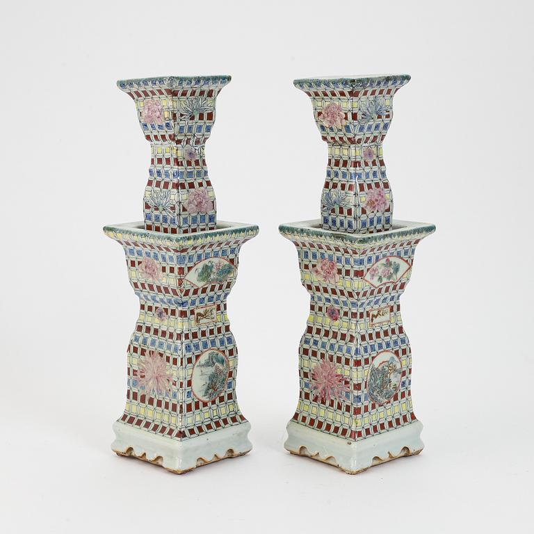 A pair of Chinese porcelain candlesticks, 19th century.