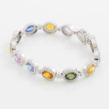 Bracelet 18K white gold set with oval-cut multicoloured sapphires and brilliant-cut diamonds.