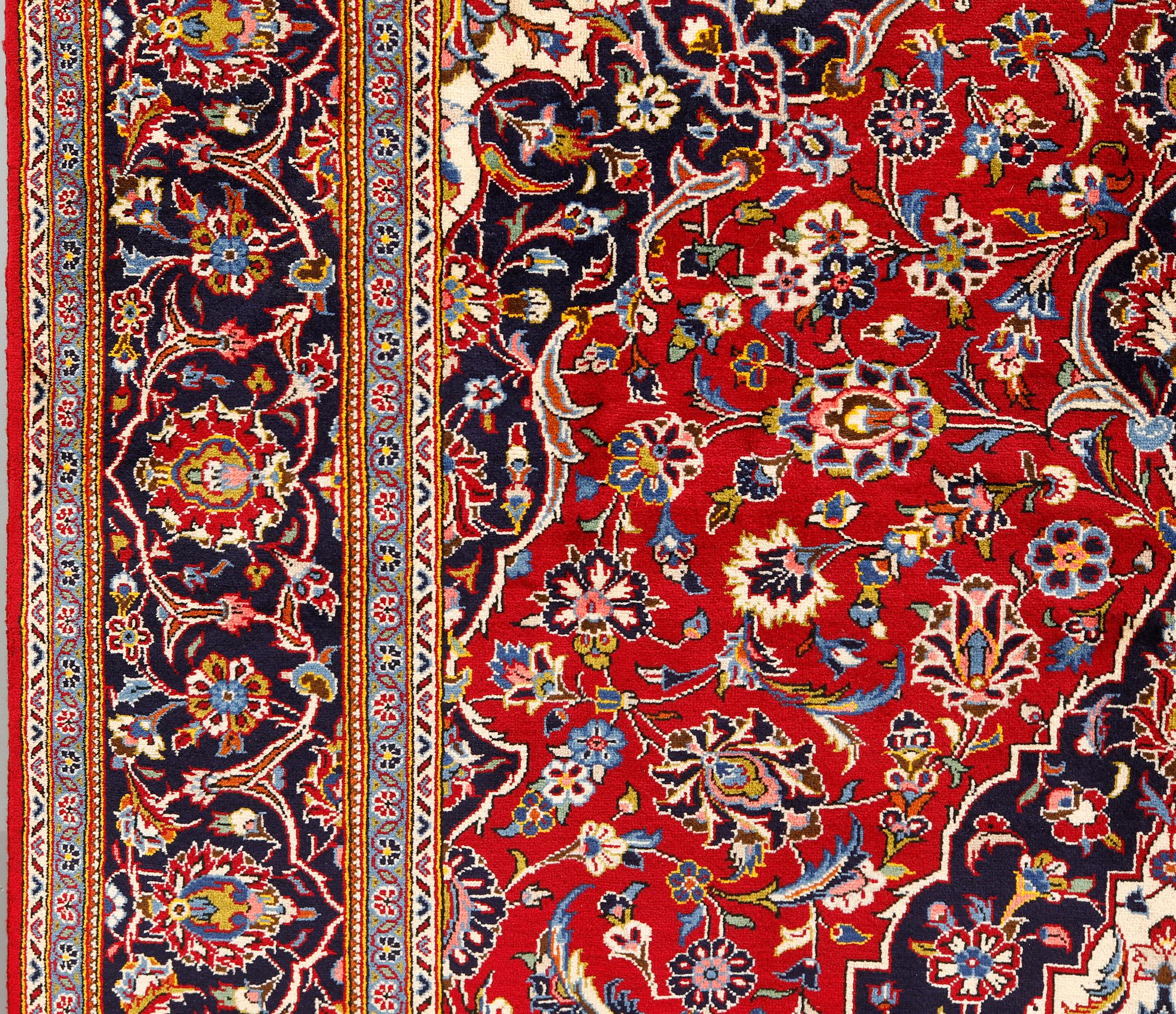 A Kashan carpet, approximately 315 x 200 cm.