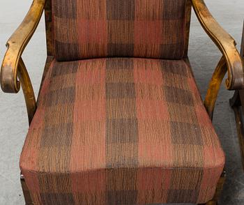 A pair of 1920s easy chairs.