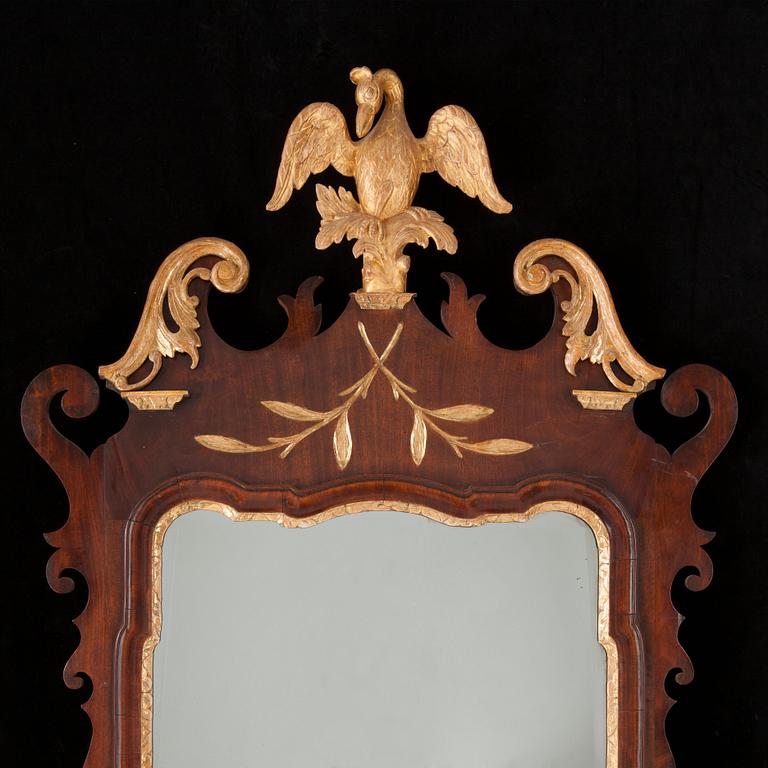 An English late Baroque mid 18th century mirror.