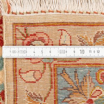 A part silk Theran rug, c. 216 x 136 cm.