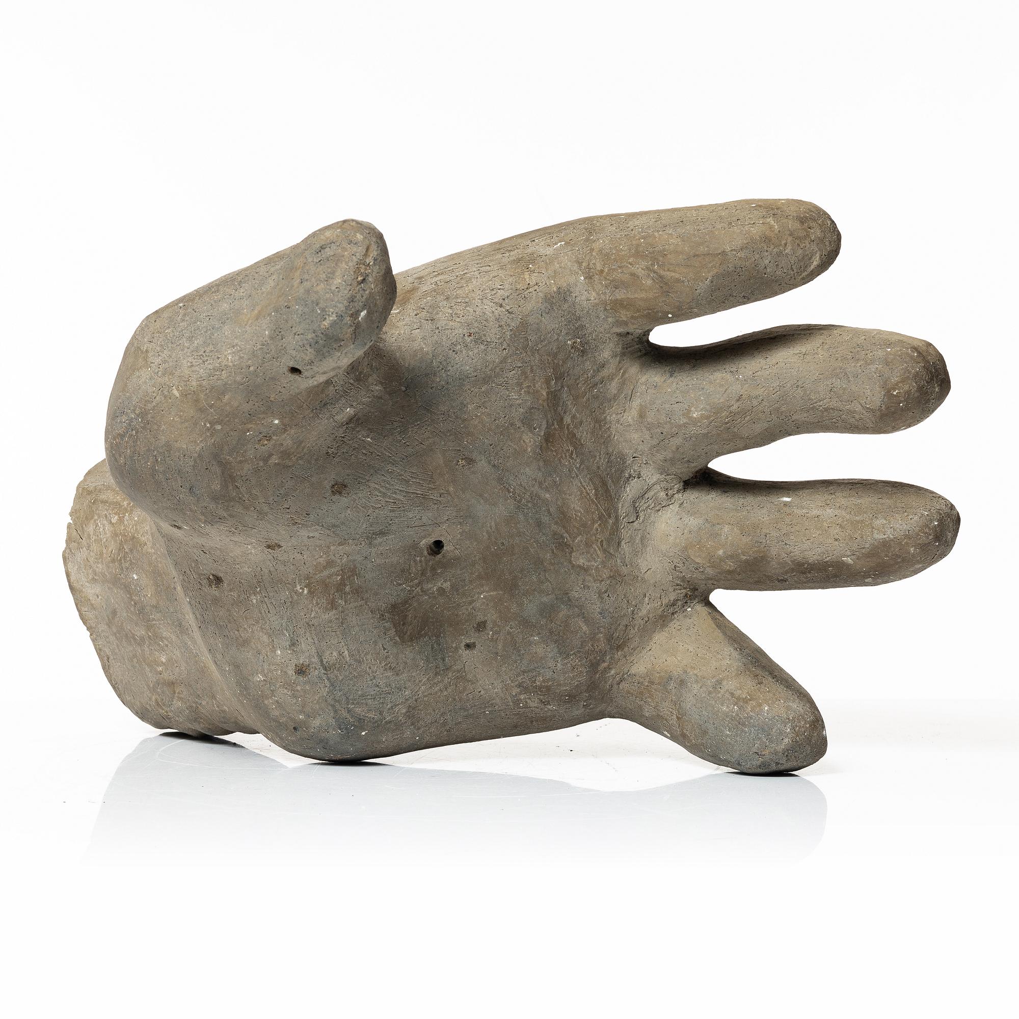 Allan Ebeling, a ceramic sculpture of a hand.