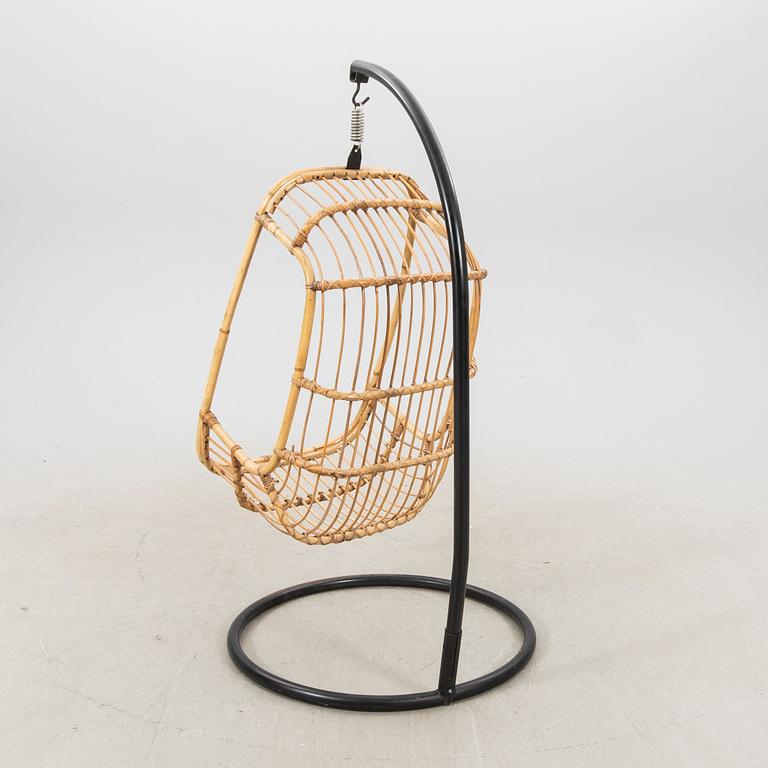 A bamboo and rattan hanging chair from the second half of the 20th century.
