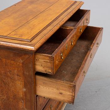 A Swedish root veneered late baroque chest of drawers, first half of the 18th century.