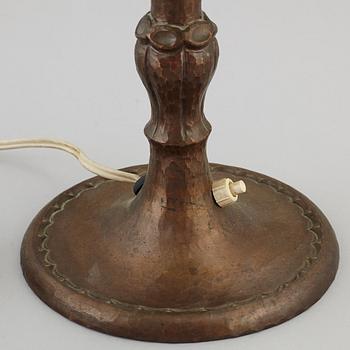 An copper table light, first half of the 20th century.