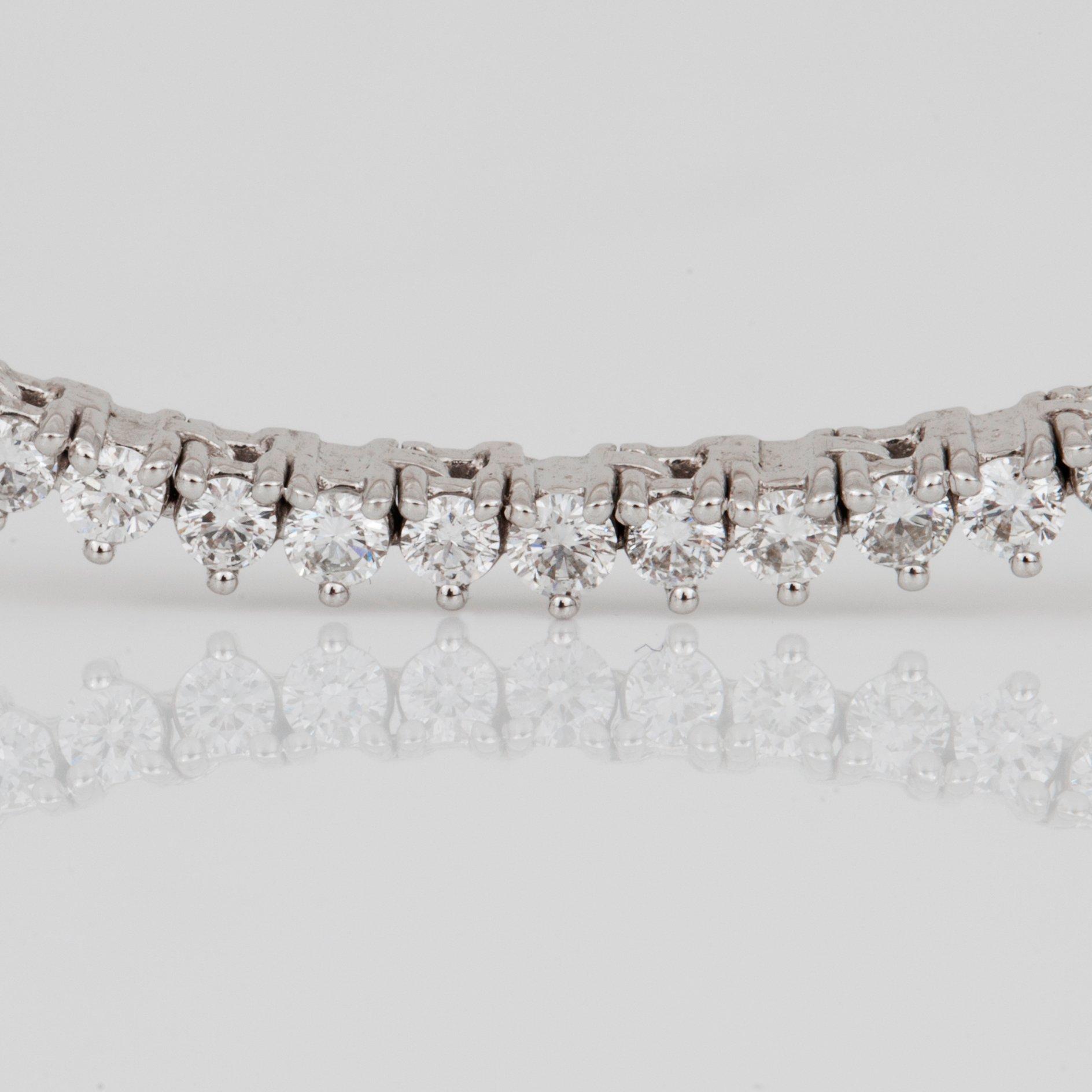 A circa 7.00 ct brilliant-cut diamond line necklace.