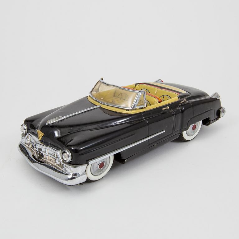 A Nomura Toys Cadillac Japan 1950s.