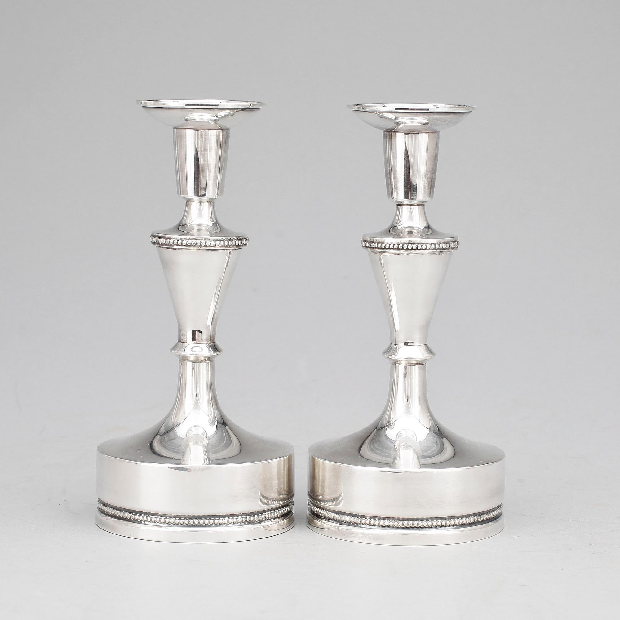 LJUSSTAKAR, ett par, silver, Mobergs Guldsmeds AB, Stockholm, empirstil, 1967. Totalvikt ca 748.
