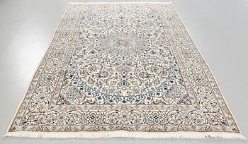 A NAIN PART SILK RUG, 306 x 191 cm.