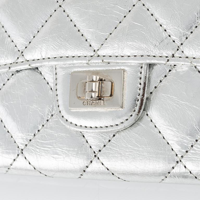 Chanel, a quilted silver leather wallet, 2006-08.