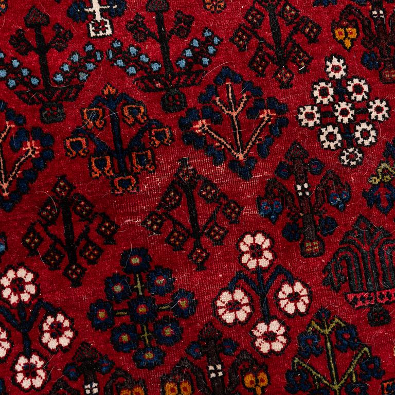 An oriental rug, c. 365 x 285 cm.