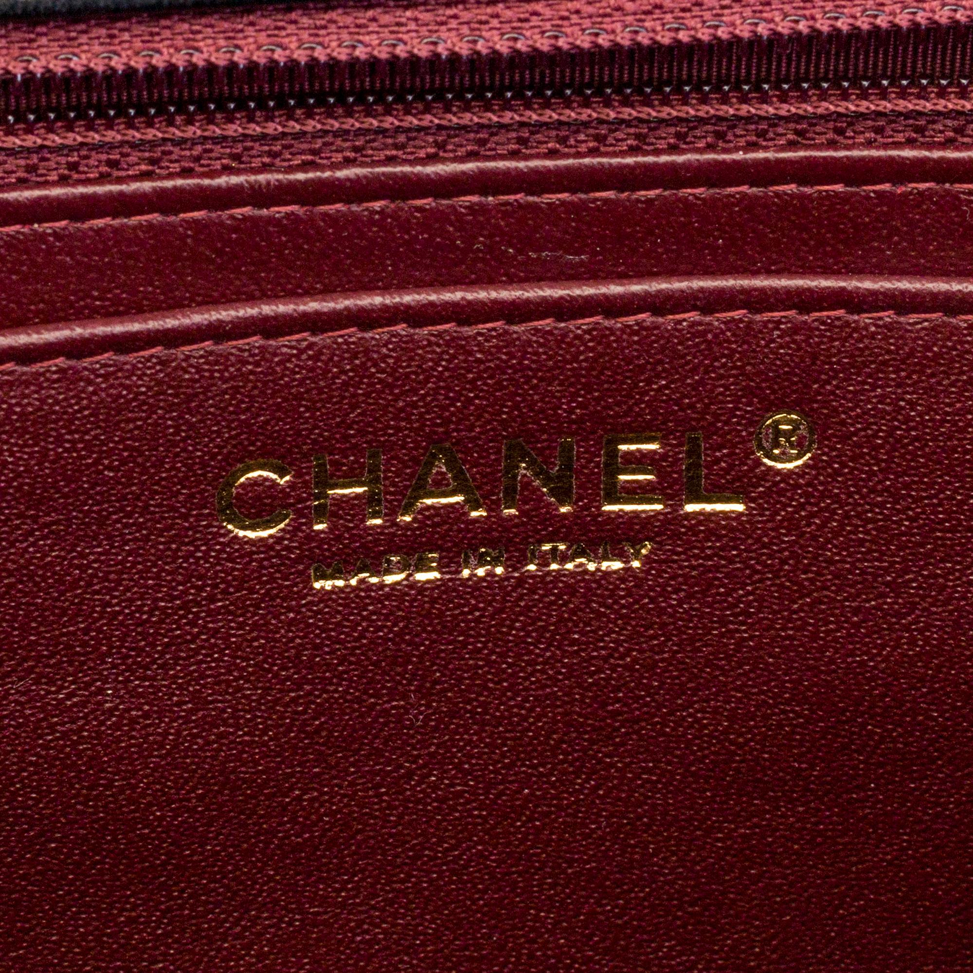 A "Double flap bag maxi" by Chanel 2009-10.