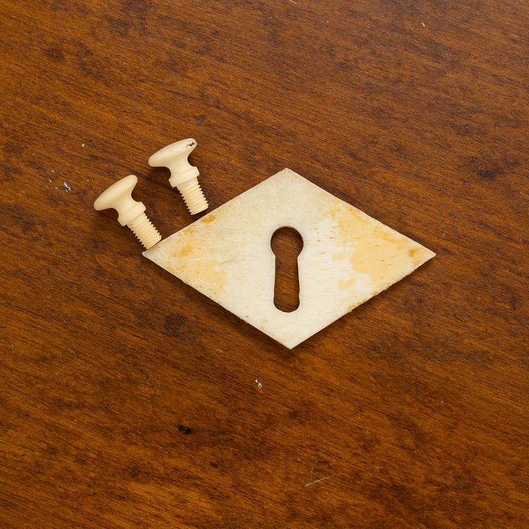 A birch-veneered dresser, second half of the 19th century.