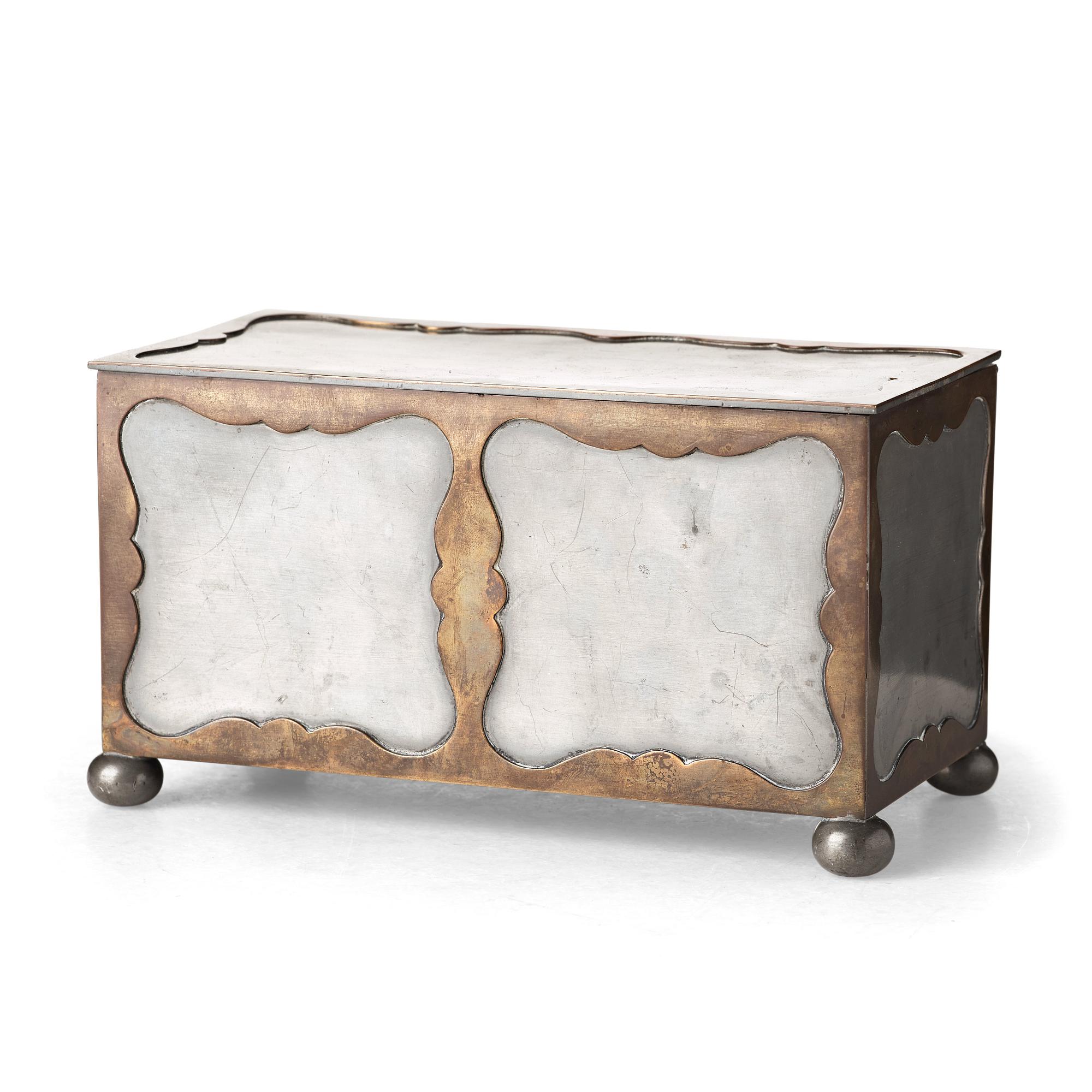 Firma Svenskt Tenn, a pewter and brass box, Stockholm 1930, model A 854.
