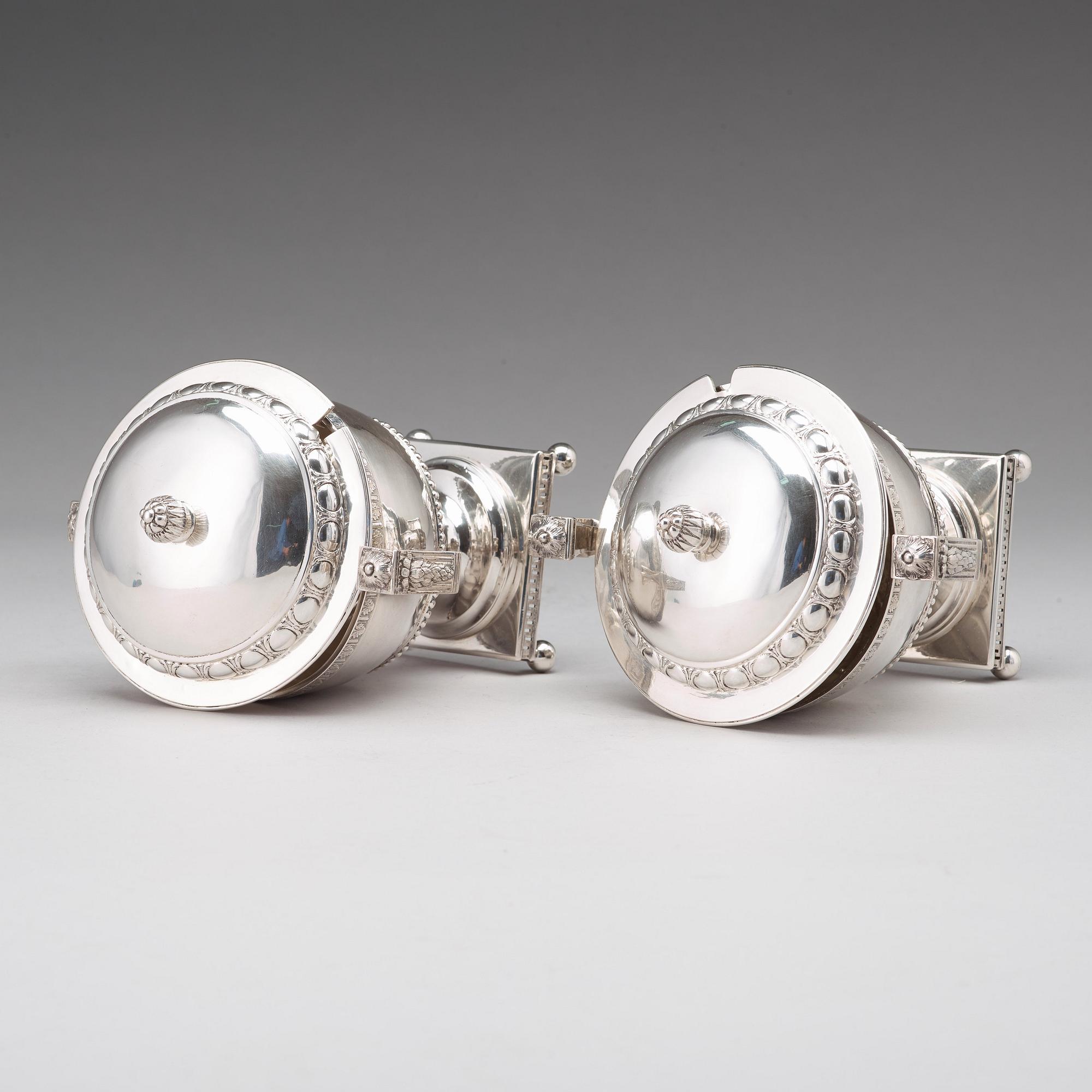 A pair of Swedish late 18th century silver sugar bowls and covers, mark of Pehr Zethelius, Stockholm 1780 and 1781.
