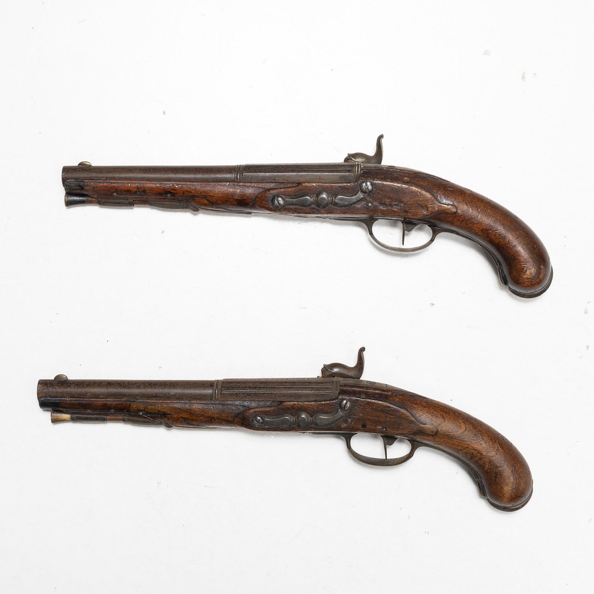 A apir of percussion pistols, signed David Bars, Stockholm (1686-1759),