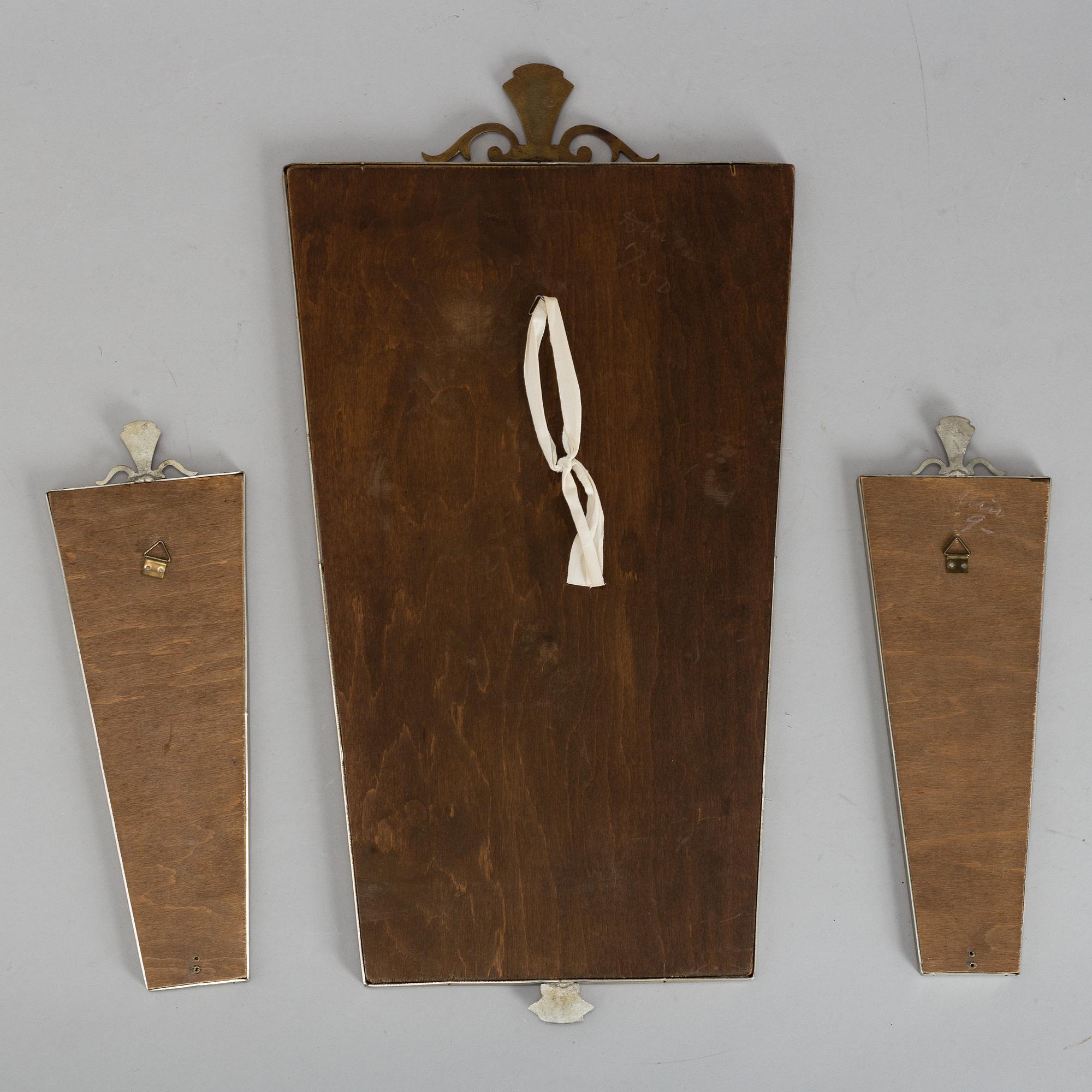 A 1930's mirror and a pair of sconces.