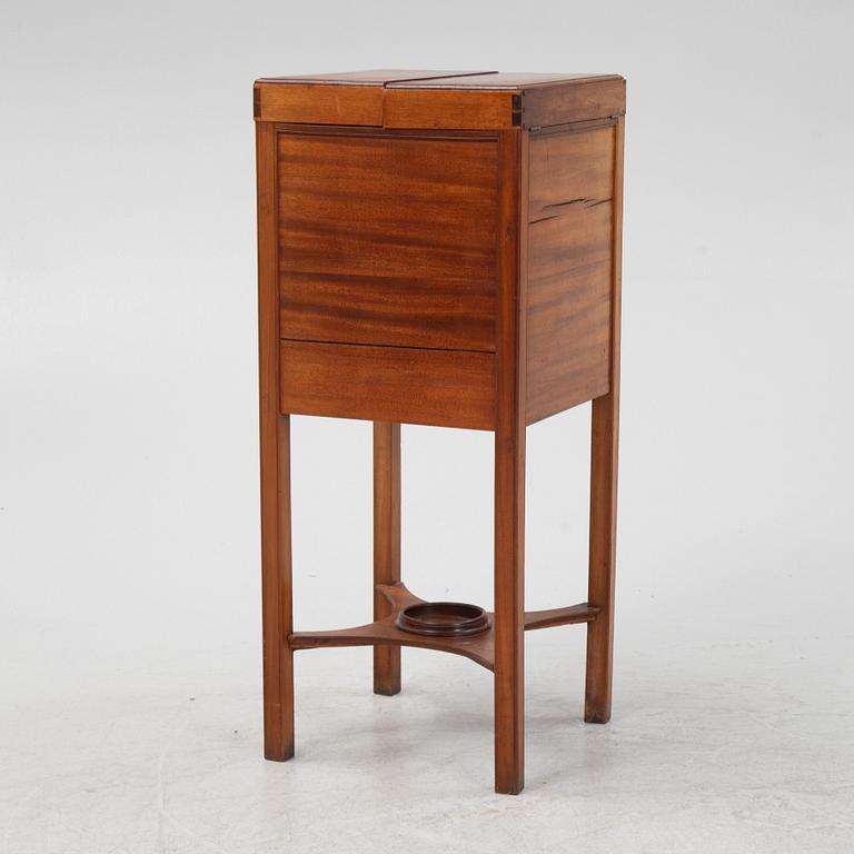 A mahogany shaving stand, 19th Century.
