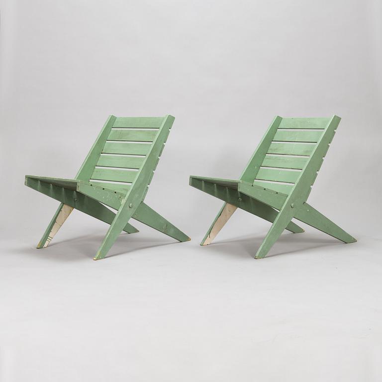 A pair of mid-20th century garden chairs.