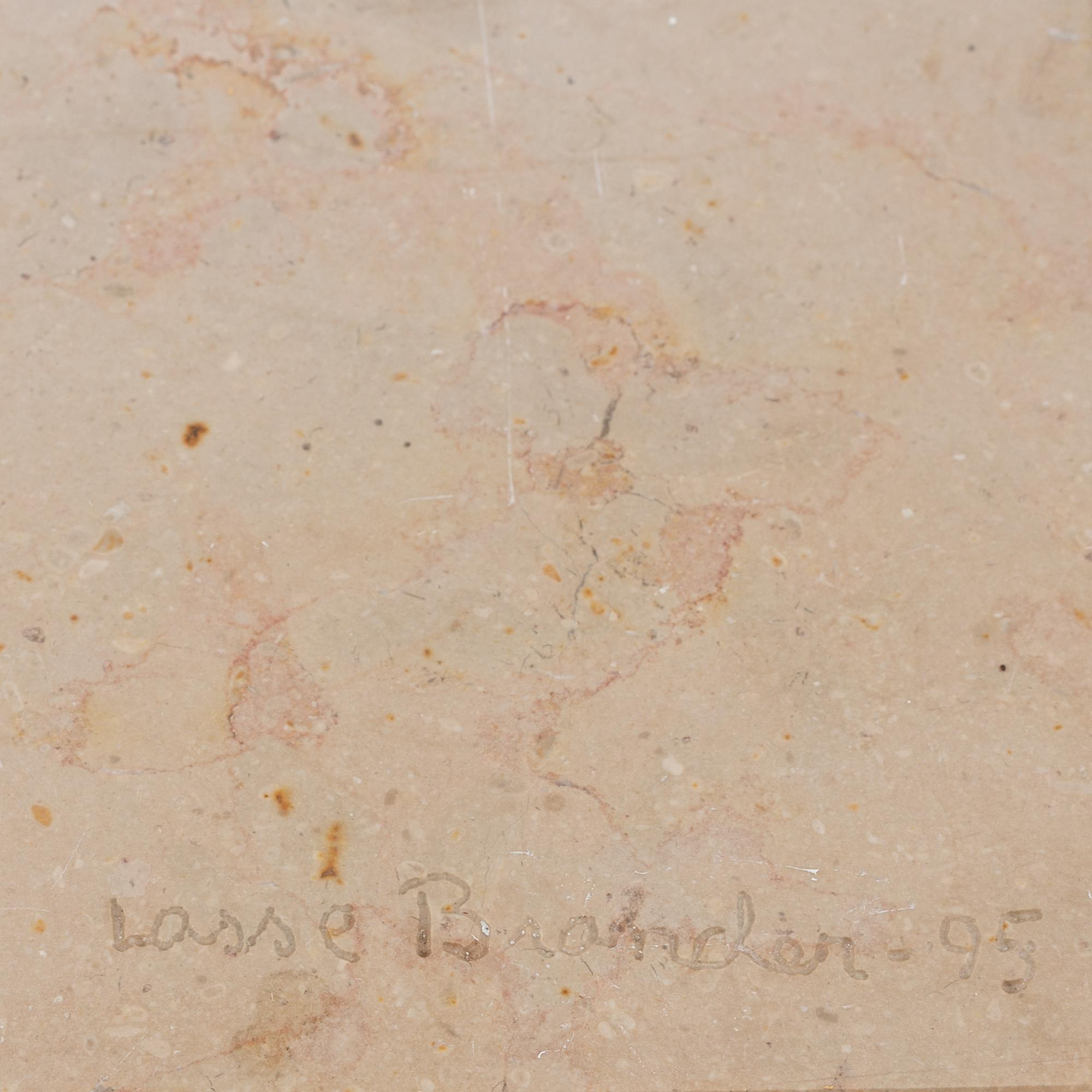 Lasse Brander, a sculpture, 3 parts, porphyry and light coloured stone. Signed and dated -95.