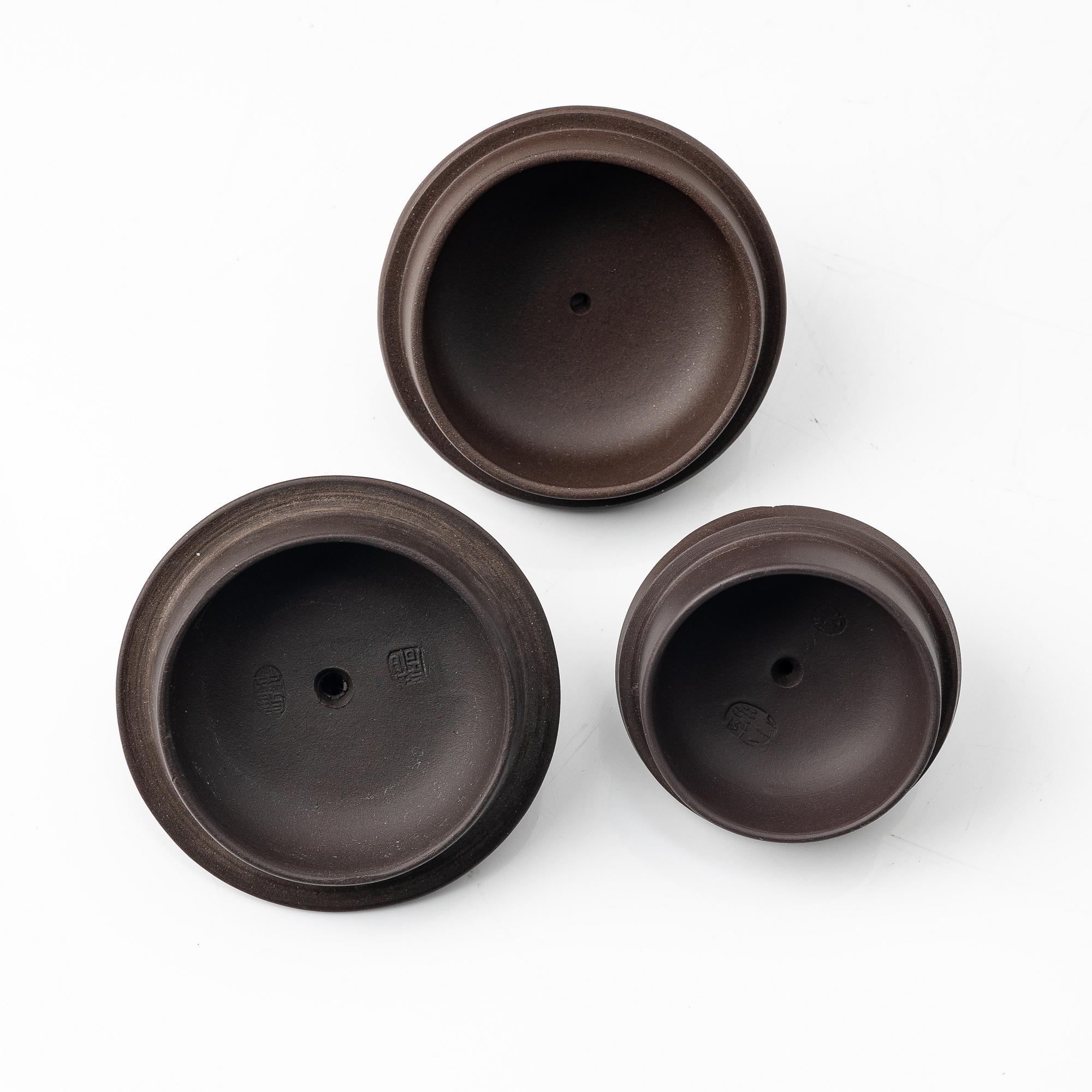 A group of four Chinese brown yixing teapots, 1980/90s.