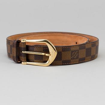 A belt by Louis Vuitton.