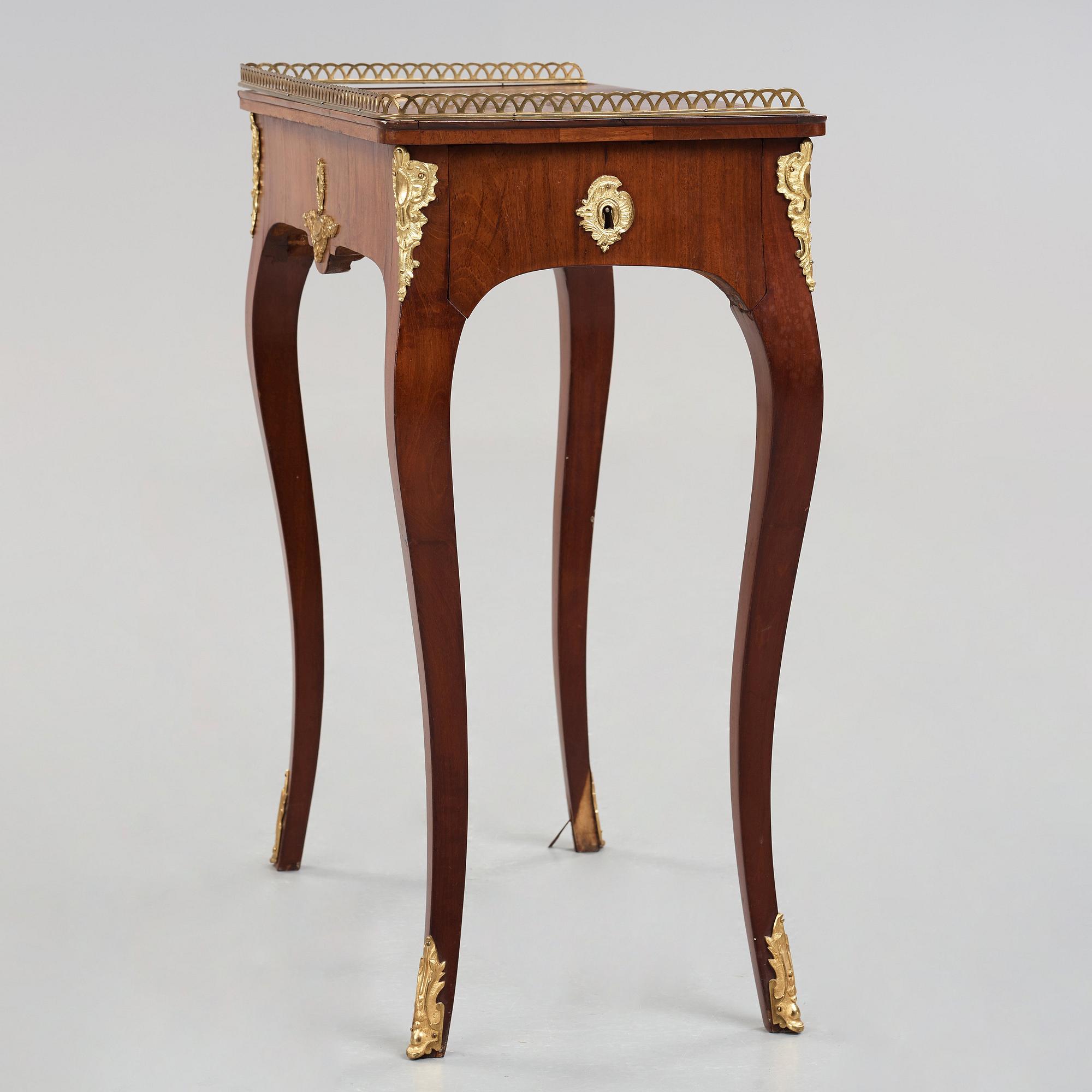 A Swedish Rococo 18th century table in the manner of Lars Nordin (master in Stockholm 1743-1773).