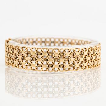 Arm bracelet, 18K gold, x-link.