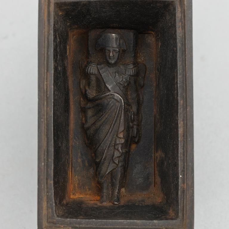 A cast iron inkwell in the form of the sarcophagus of Napoleon, Königliche Preußische Eisengießerei, Berlin, ca. 1815-20.